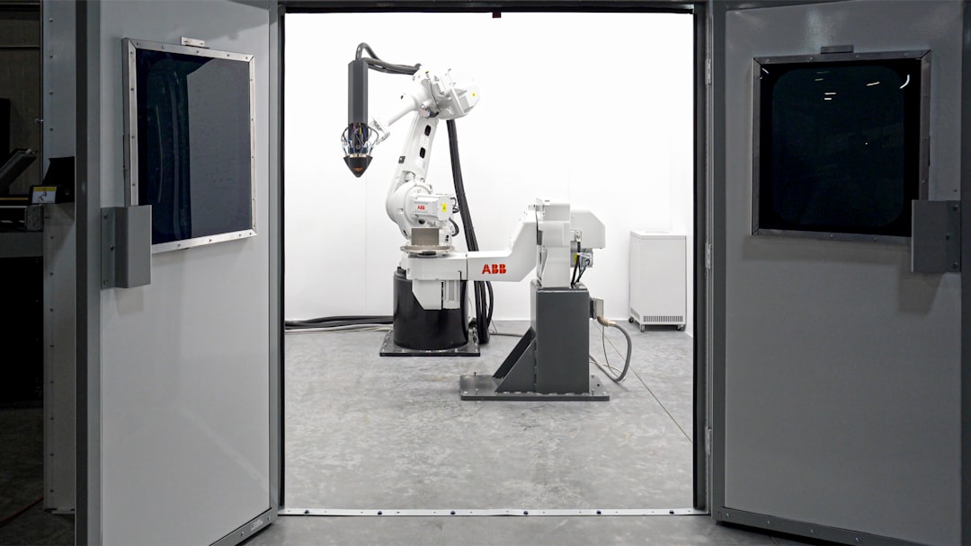 Large-format additive manufacturing equipment. Photo by Hermeus on Unsplash.